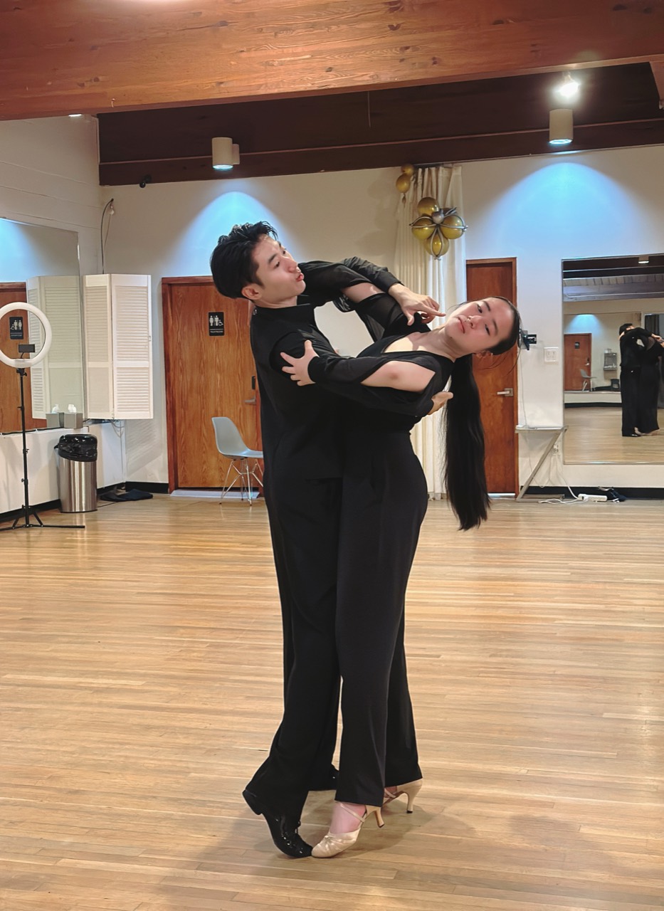 Ballroom students practicing an elegant Standard line